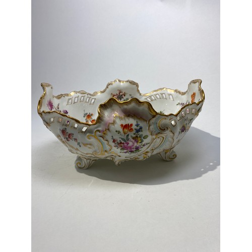 4501 - A German porcelain bowl of Rococo form with handpainted floral sprays throughout, gilt highlights an... 