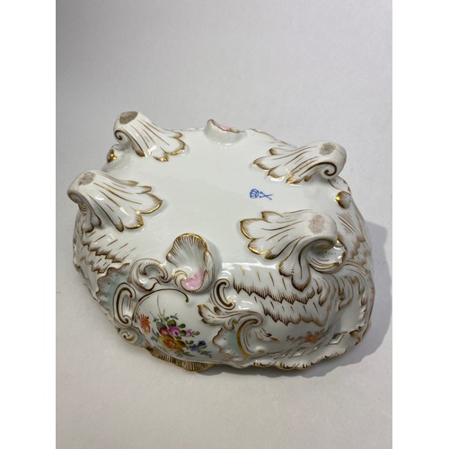 4501 - A German porcelain bowl of Rococo form with handpainted floral sprays throughout, gilt highlights an... 