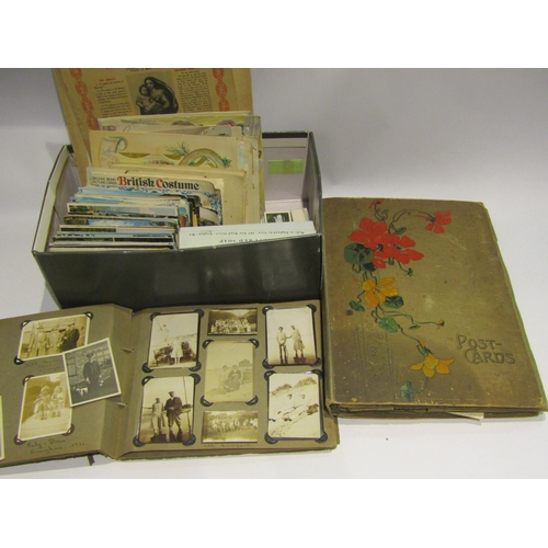 4512 - A mixed lot of ephemera including 20th Century postcards, cigarette cards, tea cards, etc.