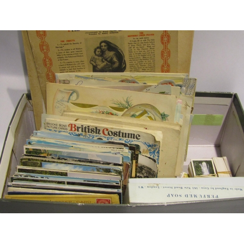 4512 - A mixed lot of ephemera including 20th Century postcards, cigarette cards, tea cards, etc.