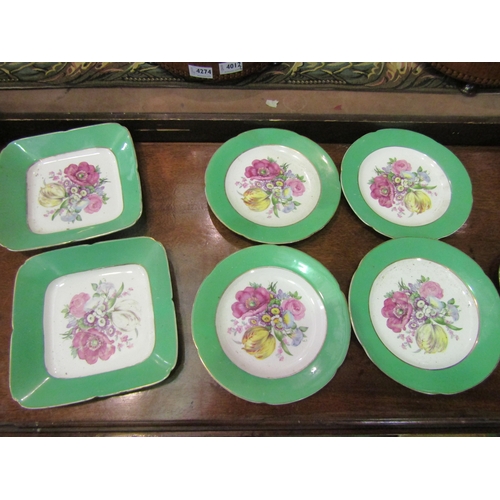 4018 - A group of T. Goode & Co. Ltd china plates, green border with central floral pattern (8)