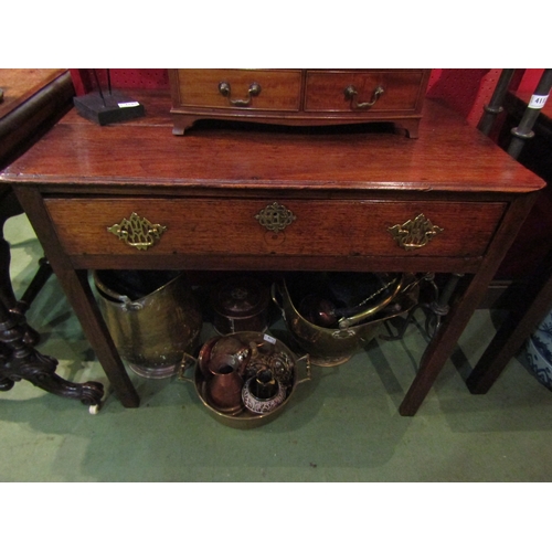 4111 - A circa 1780 provincial oak side table, the plank top over a single frieze drawer on internal chamfe... 