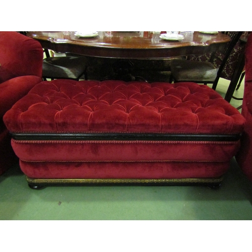 4146 - A Victorian upholstered and ebonised box seat ottoman, the hinged buttoned seat over bun feet and wh... 