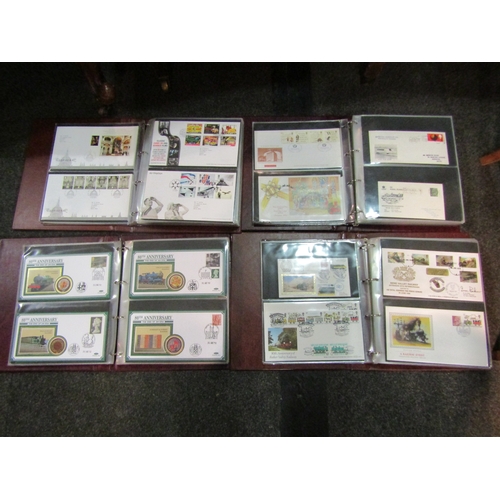 1650 - A box containing seven albums of first day covers including railway and sporting examples