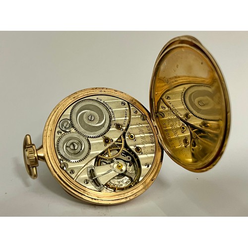 5081 - ELGIN USA: A circa 1920 Art Deco Elgin USA 9k gold open-faced pocket watch of slim proportions, the ... 