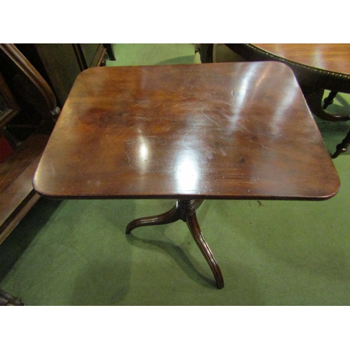 4286 - A George III flame mahogany round cornered tilt-top wine table over a baluster and ring-turned colum... 