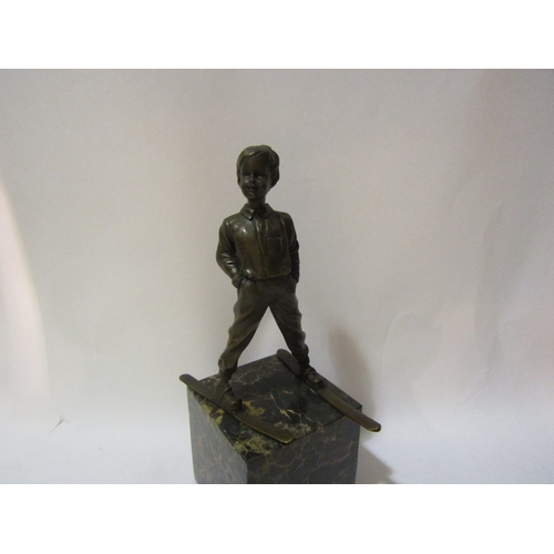 4071 - A bronze boy on ski's mounted on marble plinth, after Preiss, 29cm tall