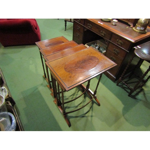 4157 - A quartetto nest of George III revival mahogany graduating occasional tables on ring turned legs and... 