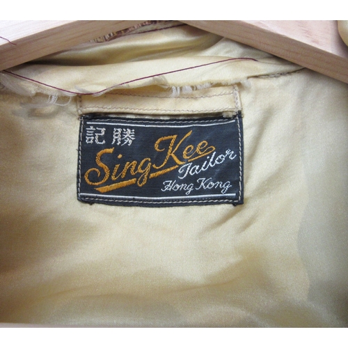 1040 - Three Chinese silk dresses, two bearing retail labels