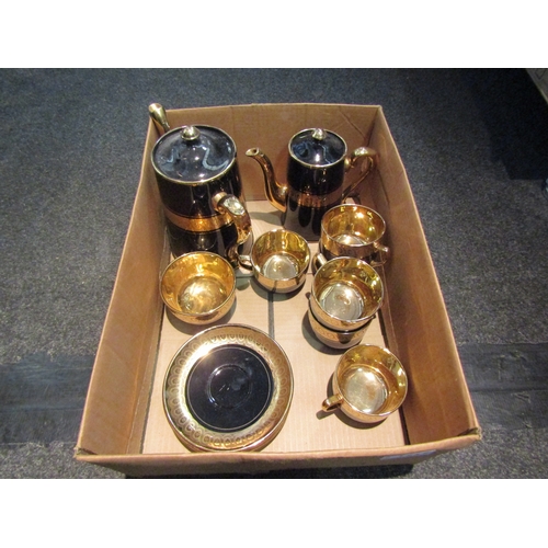 1497 - A Sevres Davenport gilt and black six place part tea / coffee set