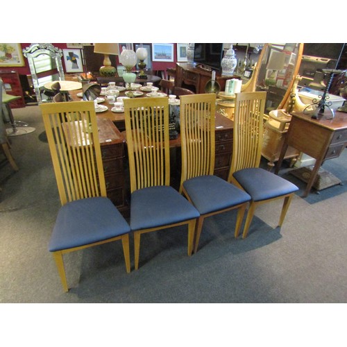 1102 - In the manner of Oak Furnitureland a set of eight natural oak high back dining chairs with chamfered... 