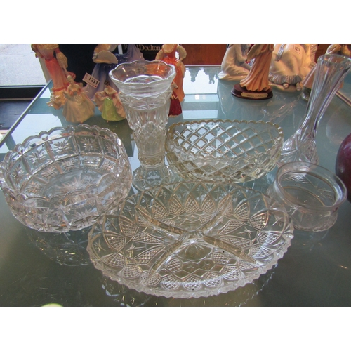 1326 - Seven pieces of glassware including cut glass bowl, two vases and an iridescent vase, chips to rim