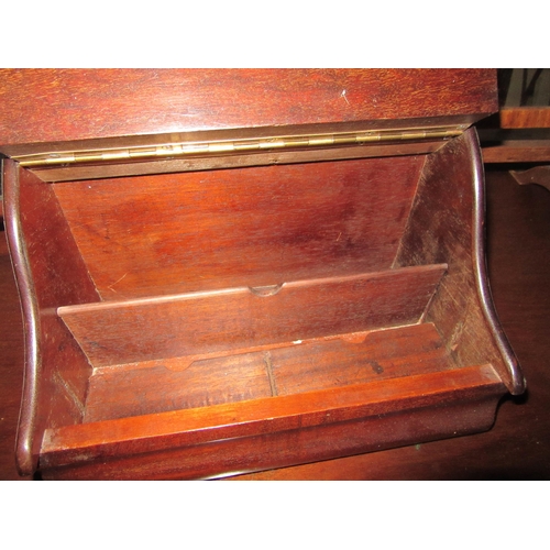 1015 - A Georgian mahogany toilet mirror, a 1930's table mirror and a lidded letter rack (3)