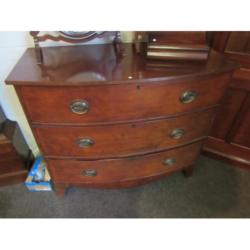 1016 - A Georgian mahogany bow-fronted chest of three drawers, 91cm tall x 50cm deep x 104cm wide