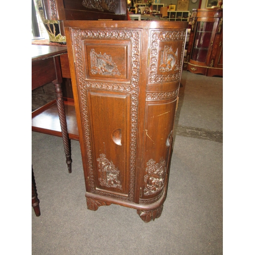 1024 - A Chinese hardwood drinks cabinet with carved scenes, 92cm tall x 37.5cm deep x 76cm wide