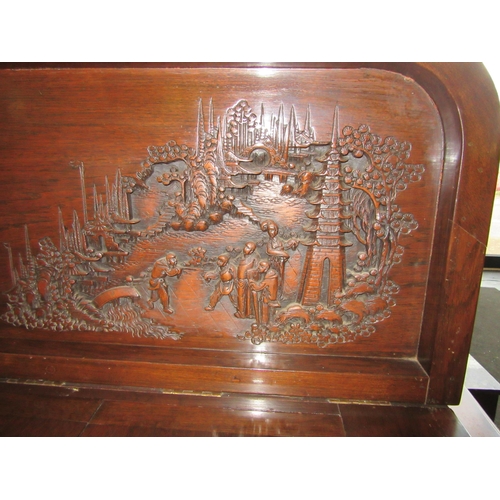 1024 - A Chinese hardwood drinks cabinet with carved scenes, 92cm tall x 37.5cm deep x 76cm wide