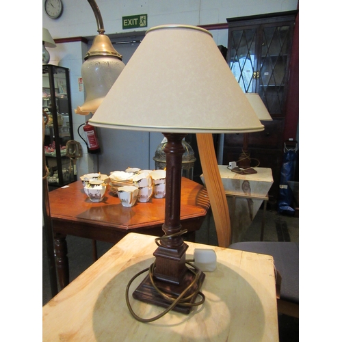 1100 - A pair of column form table lamps