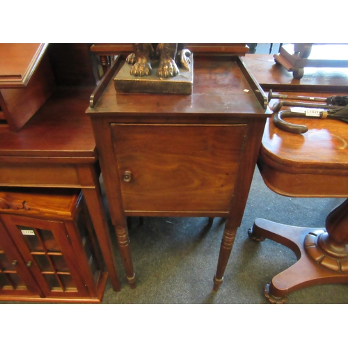 1133 - A Georgian mahogany pot cupboard on ring turned legs, 86cm tall x 42cm wide x 42cm deep