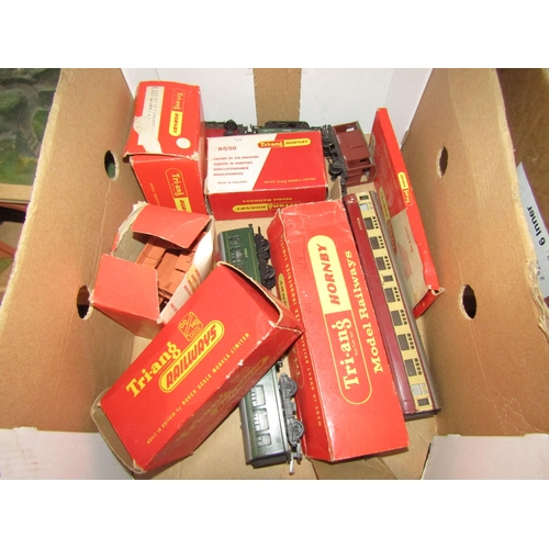 1190 - Two boxes of model railway accessories including Tri-ang and Hornby boxed examples, track, locos, bu... 