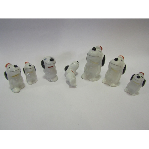 1298 - Seven miniature ceramic Snoopy figures