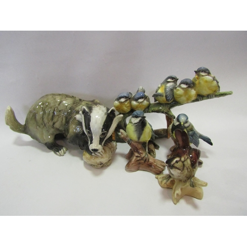 1300 - A selection of resin and ceramic animal figures including Italian pottery, Beswick 