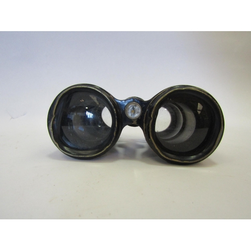 1345 - A pair of leather covered binoculars with built-in compass, no case