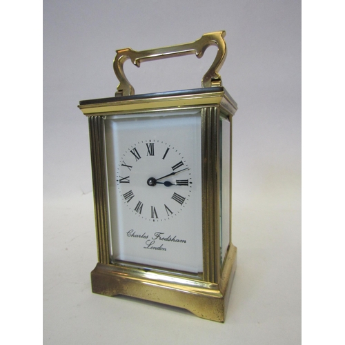 1380 - A Charles Frodsham brass cased carriage clock with key, a/f not operational