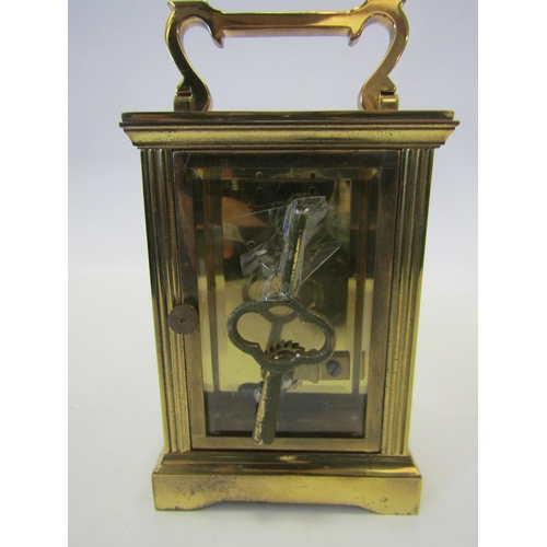 1380 - A Charles Frodsham brass cased carriage clock with key, a/f not operational