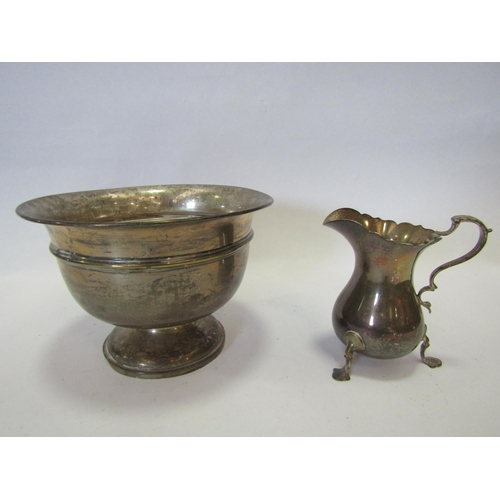 1386 - A silver footed bowl, London, and a silver cream jug, Chester (2)