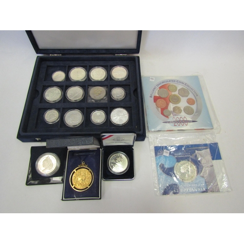 1392 - A collection of assorted coins - silver, cupro-nickel and white metal 20th Century American examples... 