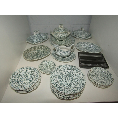 1457 - A set of child's opaque porcelain dinner service to include covered tureens, vegetable dishes, sauce... 