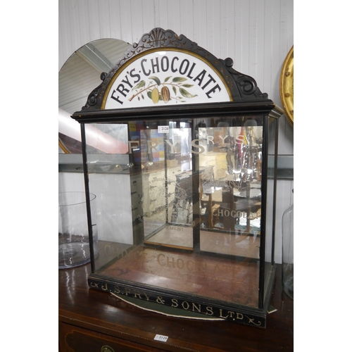 2388 - A Victorian Fry's Chocolate display cabinet with mirror back, shelves missing, 68w x 37d x 92cm tall