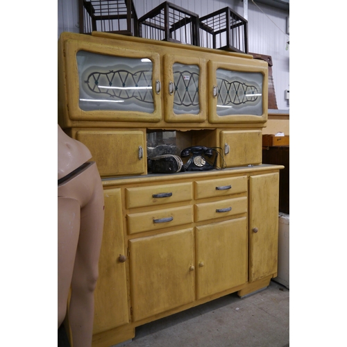 2061 - A French mid-Century rustic yellow painted kitchen pantry dresser