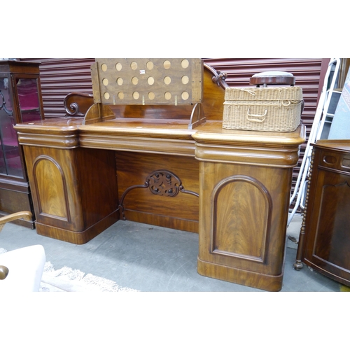 2392 - A Victorian mahogany inverted breakfront sideboard with shaped gallery back, W213cm D 63cm