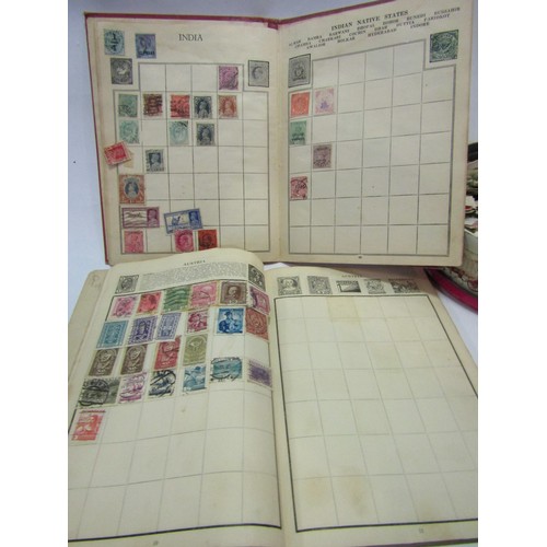 1319 - Four stamp albums with contents and a tin of loose stamps