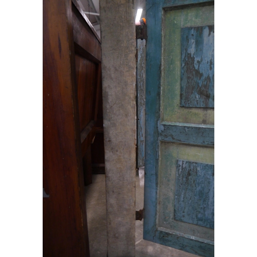 2005 - An 18th Century Sri Lankan, painted hardwood window frame, with two doors, opening to reveal iron ba... 