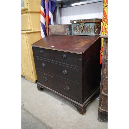 2067 - A 19th Century pine writing desk with lift-up slope over drawers