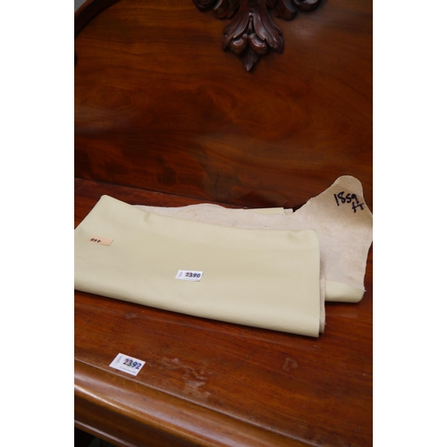 2390 - A cream quater cut section of leather cow hide