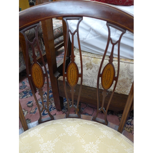 4023 - A late Victorian tub chair with inlaid Art Nouveau back, upholstered seat