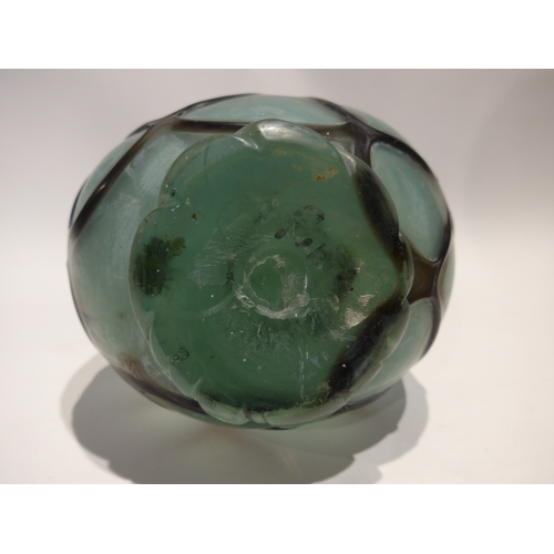 4075 - A Continental Art glass vase in turquoise with overall web casing, 28cm tall