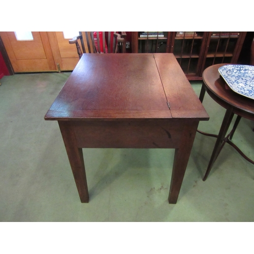 4118 - Circa 1820, an oak school teachers desk hinged top with working key over square tapering legs 78cm t... 