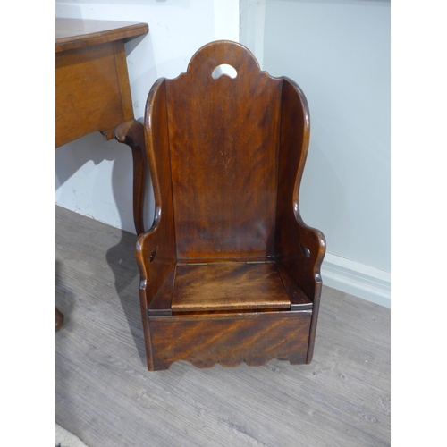 4171 - A George III mahogany child's rocking lambing chair the fret handle backrest and sides over a hinged... 