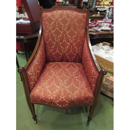 4192 - An Arts & Crafts Edwardian boxwood line inlaid mahogany armchair with carved pediment, the scroll ar... 