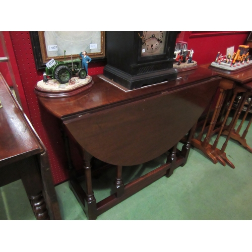 4193 - Circa 1900 stamped R. Horner an Edwardian mahogany oval top gate leg table, the rising leaves over t... 