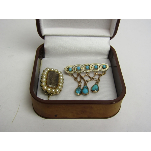 4321 - A 9ct gold white enamel and turquoise drop brooch and an unmarked memoriam pearl and woven hair pane... 