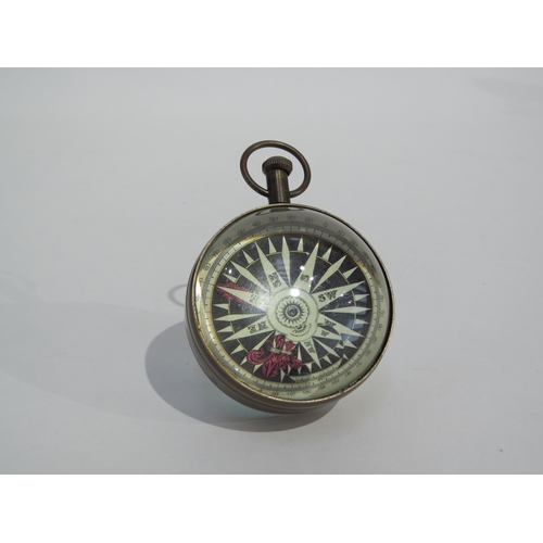 8113 - A marine 'Eye of Time' magnifying desk clock, Roman numeral dial with outer minutes track signed 'Pe... 