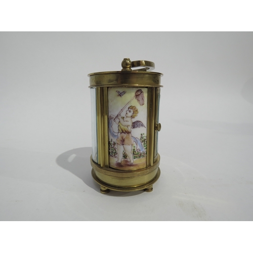 8109 - A miniature French oval brass cased carriage timepiece, coloured enamel panels to sides depicting Ch... 