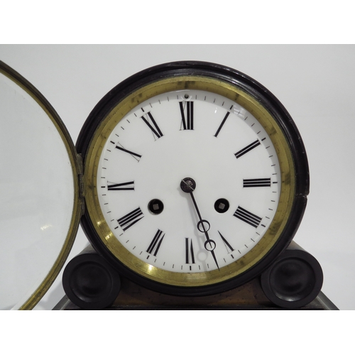 8087 - A Samuel Marti drum head mantel clock, the white enamel Roman numeral dial with moon style hands, th... 