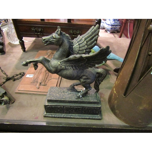 4019 - A 20th Century figure of 'Pegasus' horse on stepped base, 35cm tall