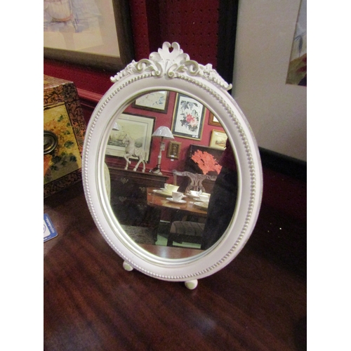 4074 - An easel back dressing table mirror, 32cm tall